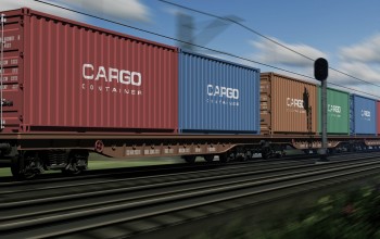 Freight train with cargo containers passing by